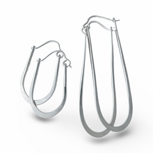 Load image into Gallery viewer, Pair of silver hoop earrings on a white background