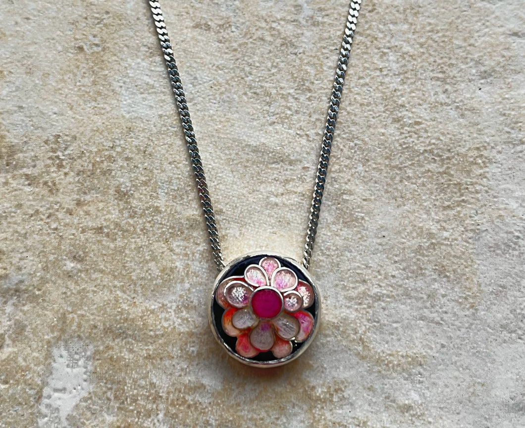 Sterling silver pendant with pink enamel flower