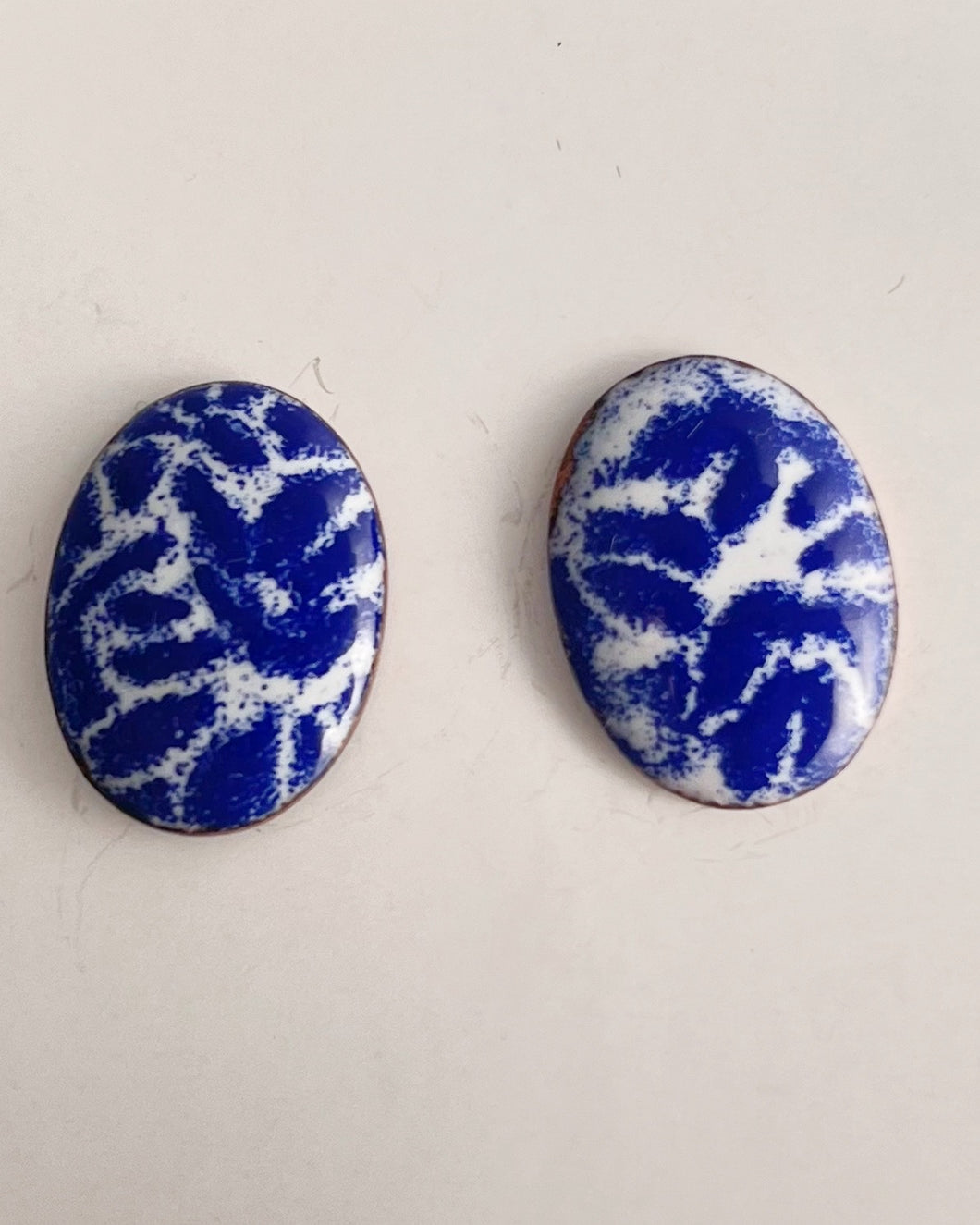 Blue and white stud earrings