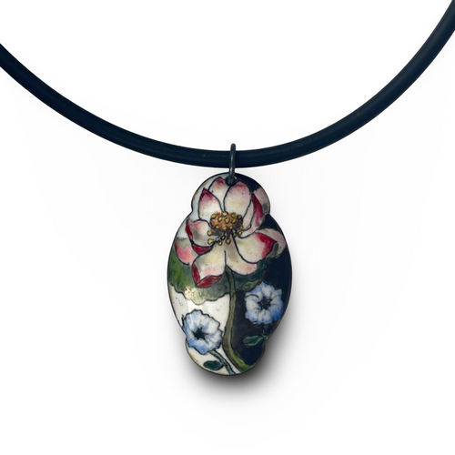Floral pendant necklace on a white background