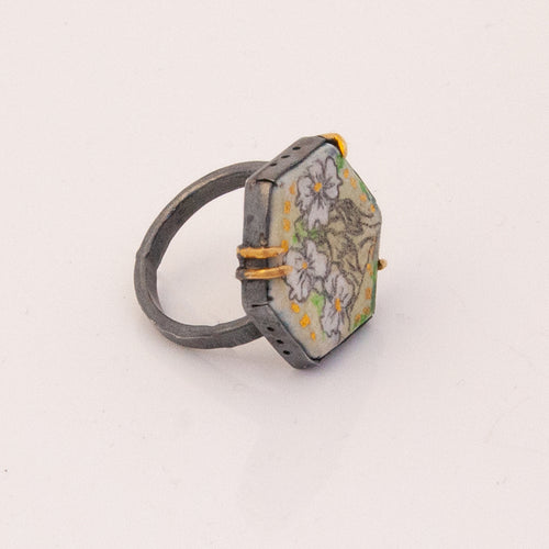 Hand drawn and painted enamel ring set in oxidized silver with 18k gold prongs, enamel has 24k gold accents, greens and yellows. 