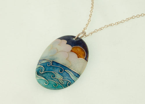 cloisonné enamel oval pendant in silver. with ocean scene